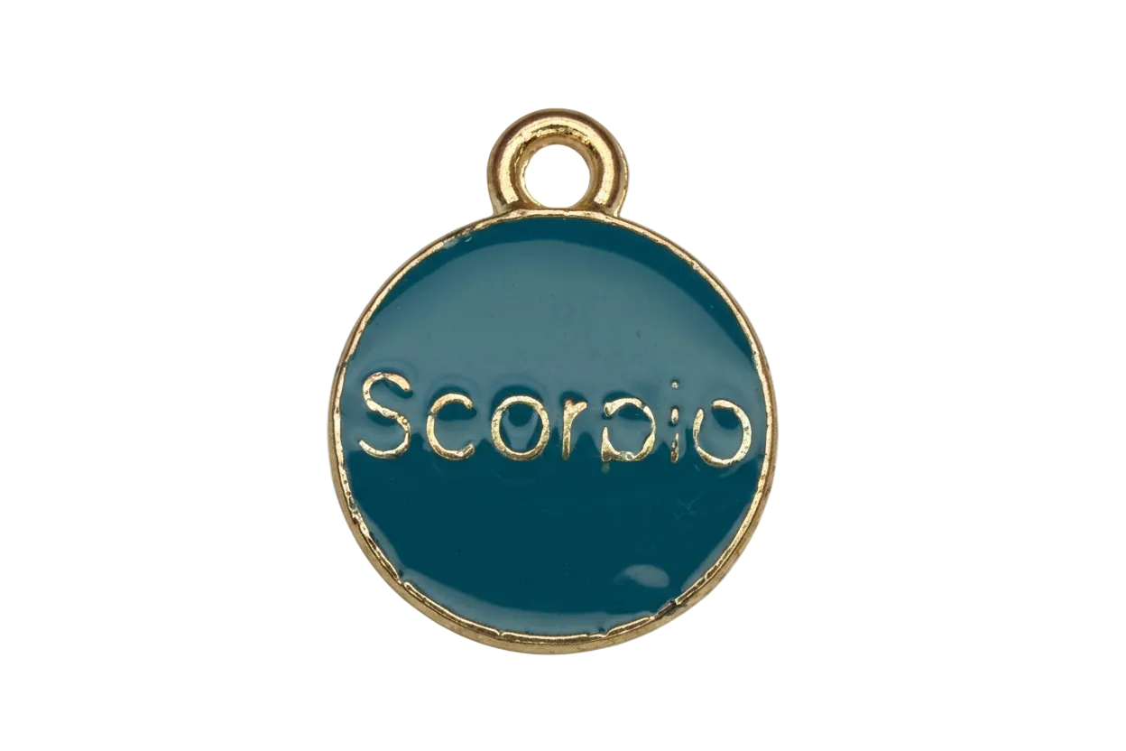 Teal enamel round disc with raised gold “SCOOP” lettering