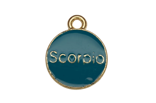 Teal enamel round disc with raised gold “SCOOP” lettering