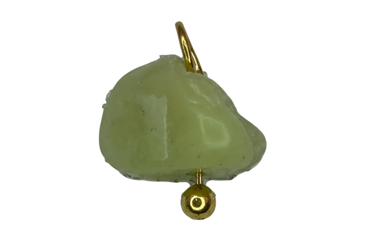 Pale lemon-lime nugget gemstone with gold finish accents on black background