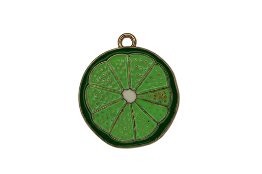 Glossy green lime slice charm with gold outline and segmented citrus details