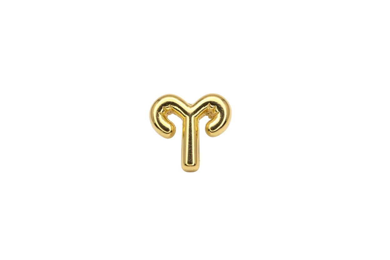 Gold Aries zodiac symbol with ram horn curves
