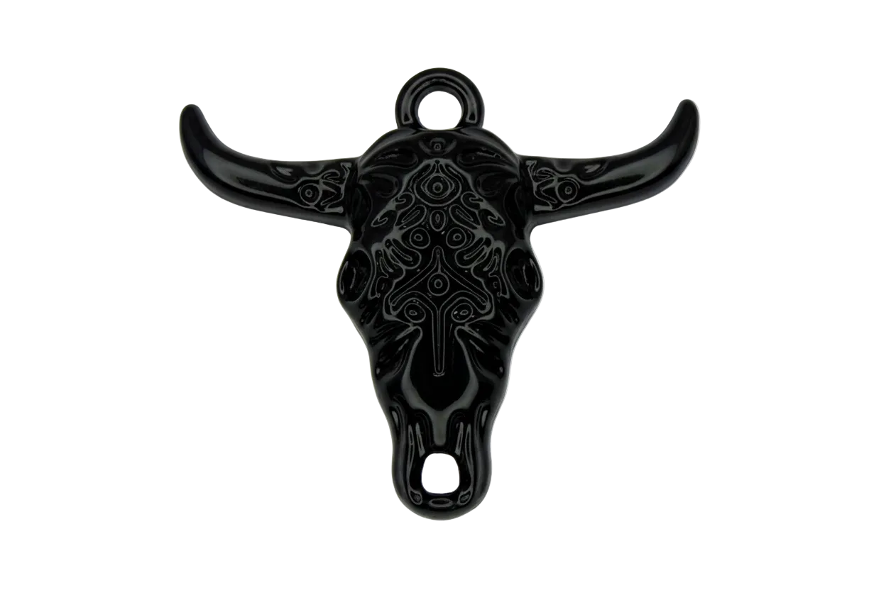 Glossy black longhorn skull pendant with ornate engraved pattern