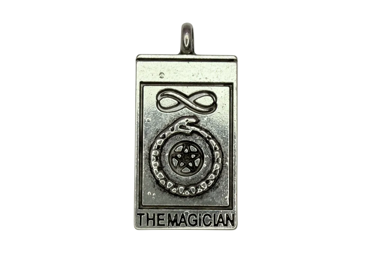 Silver-tone Magician tarot card rectangle with raised infinity symbol and circular star emblem
