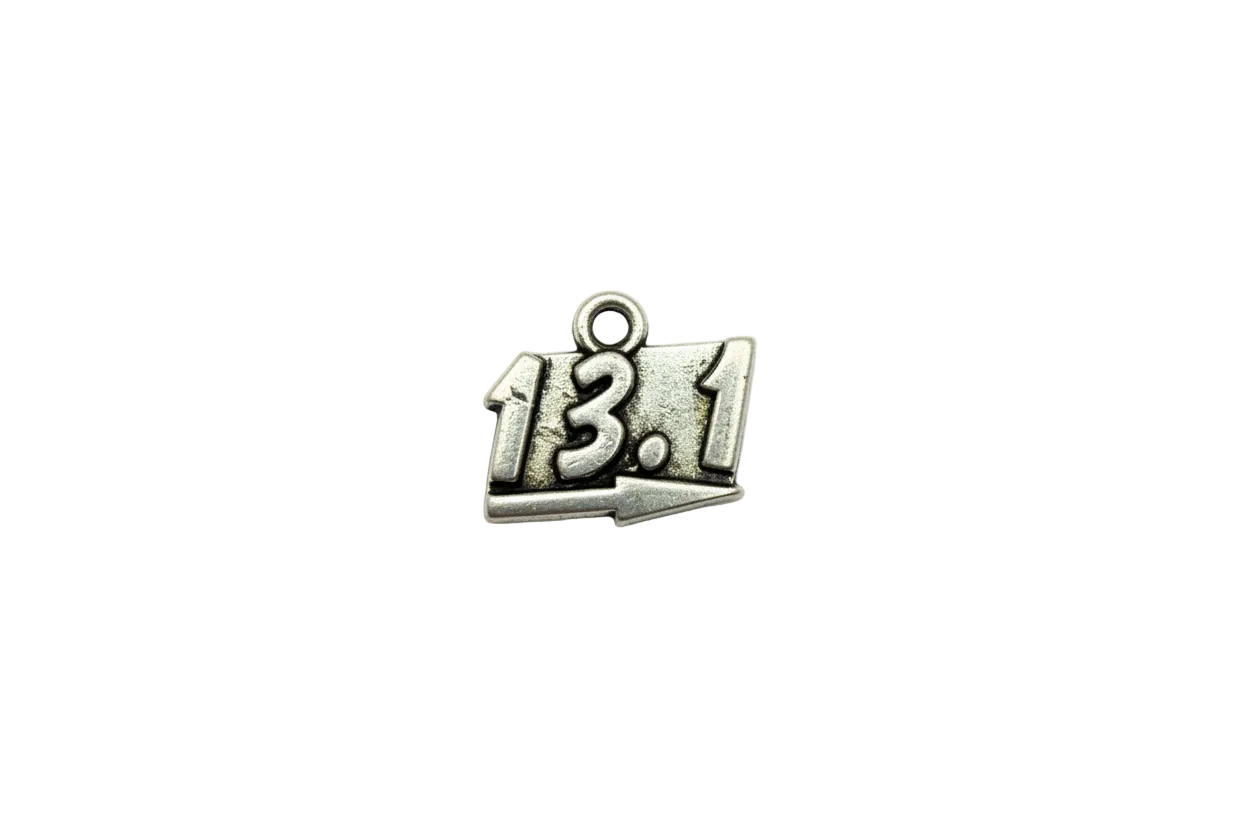 Antiqued silver 13.1 plaque with raised numbers and arrow