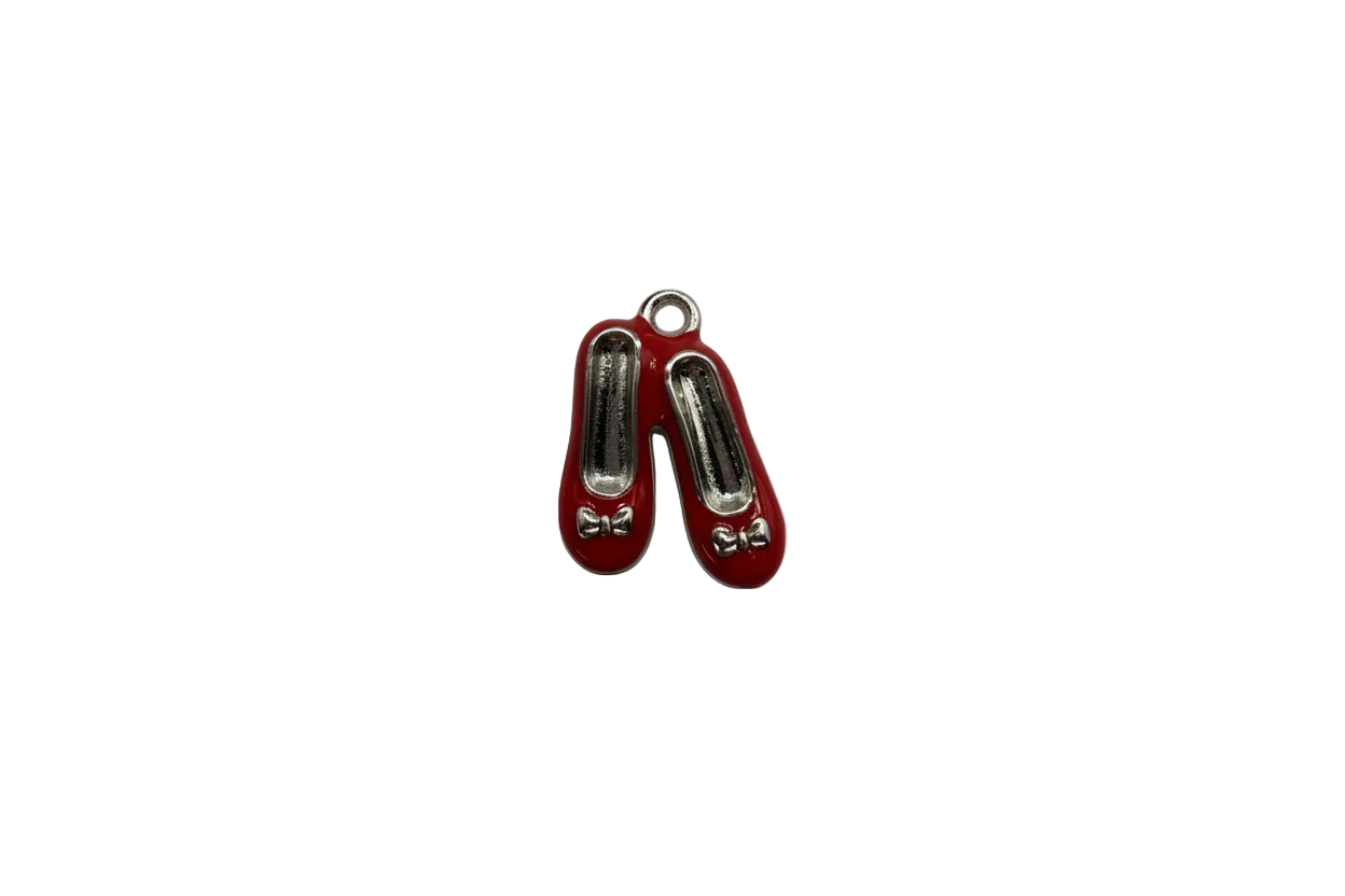 Red ballet flats with silver-toned details and bow accents