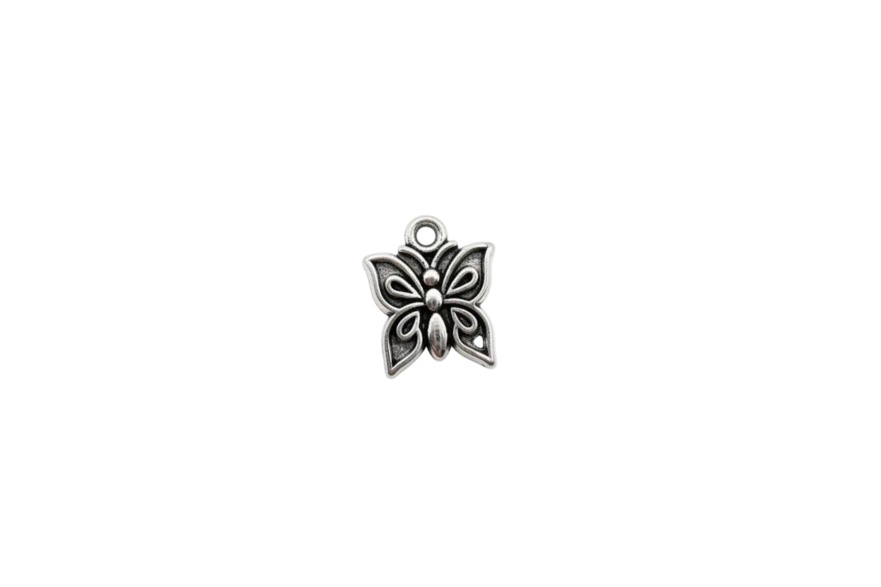 Oxidized silver butterfly with raised sculpted detailing