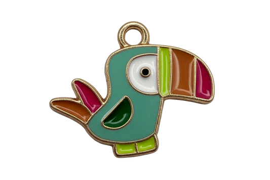 Glossy teal toucan bird enamel charm with gold outline, multicolor beak, and lime green feet