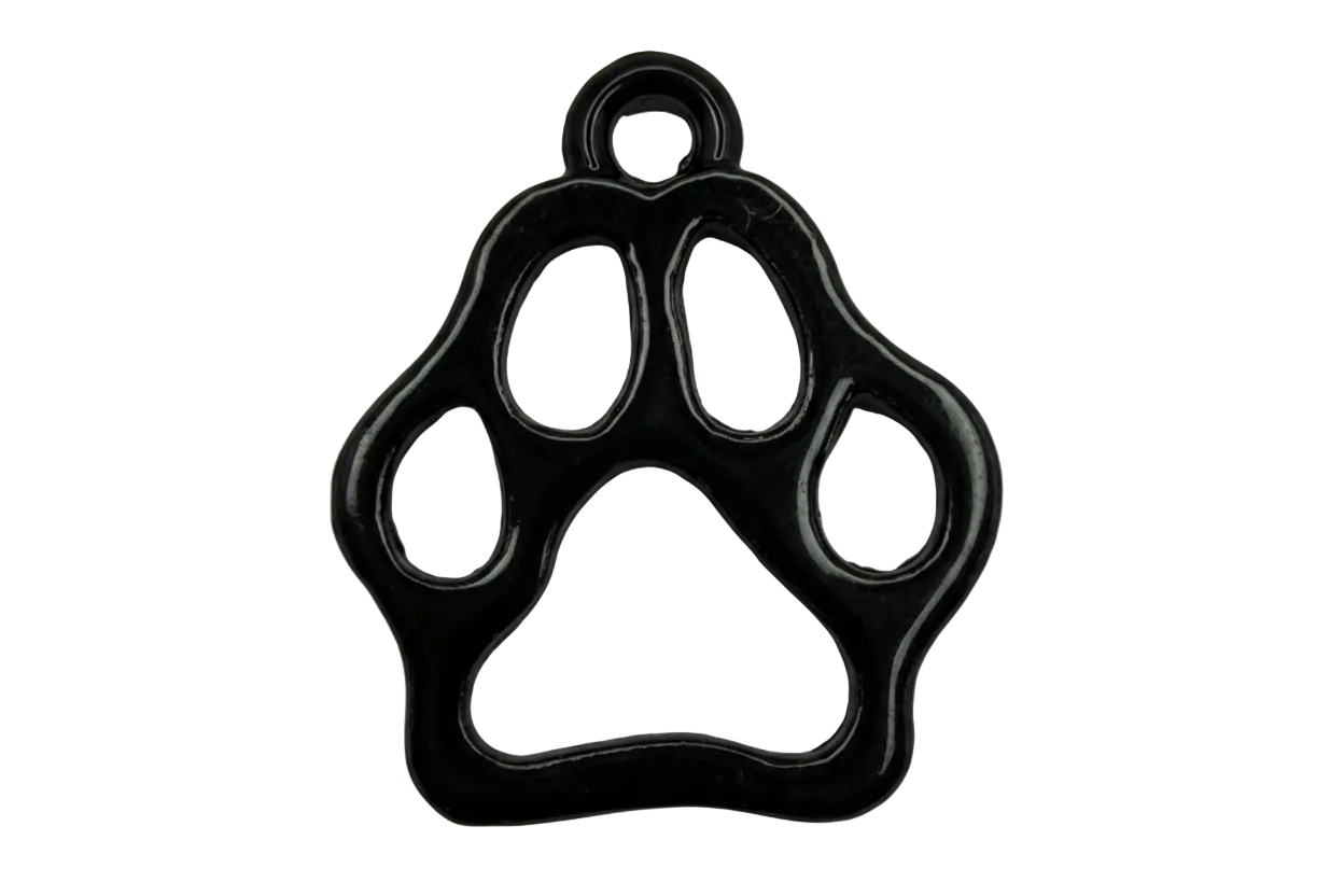 Glossy black paw print cutout charm with rounded toe pads and open center