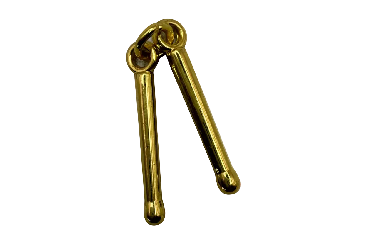 Polished gold linked batons with rounded ends on black background