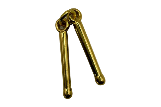 Polished gold linked batons with rounded ends on black background