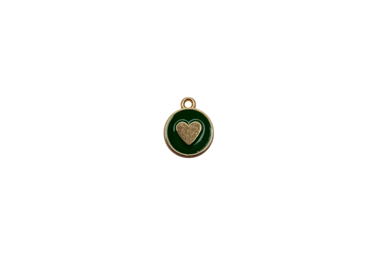 Gold medallion with deep green enamel and raised heart