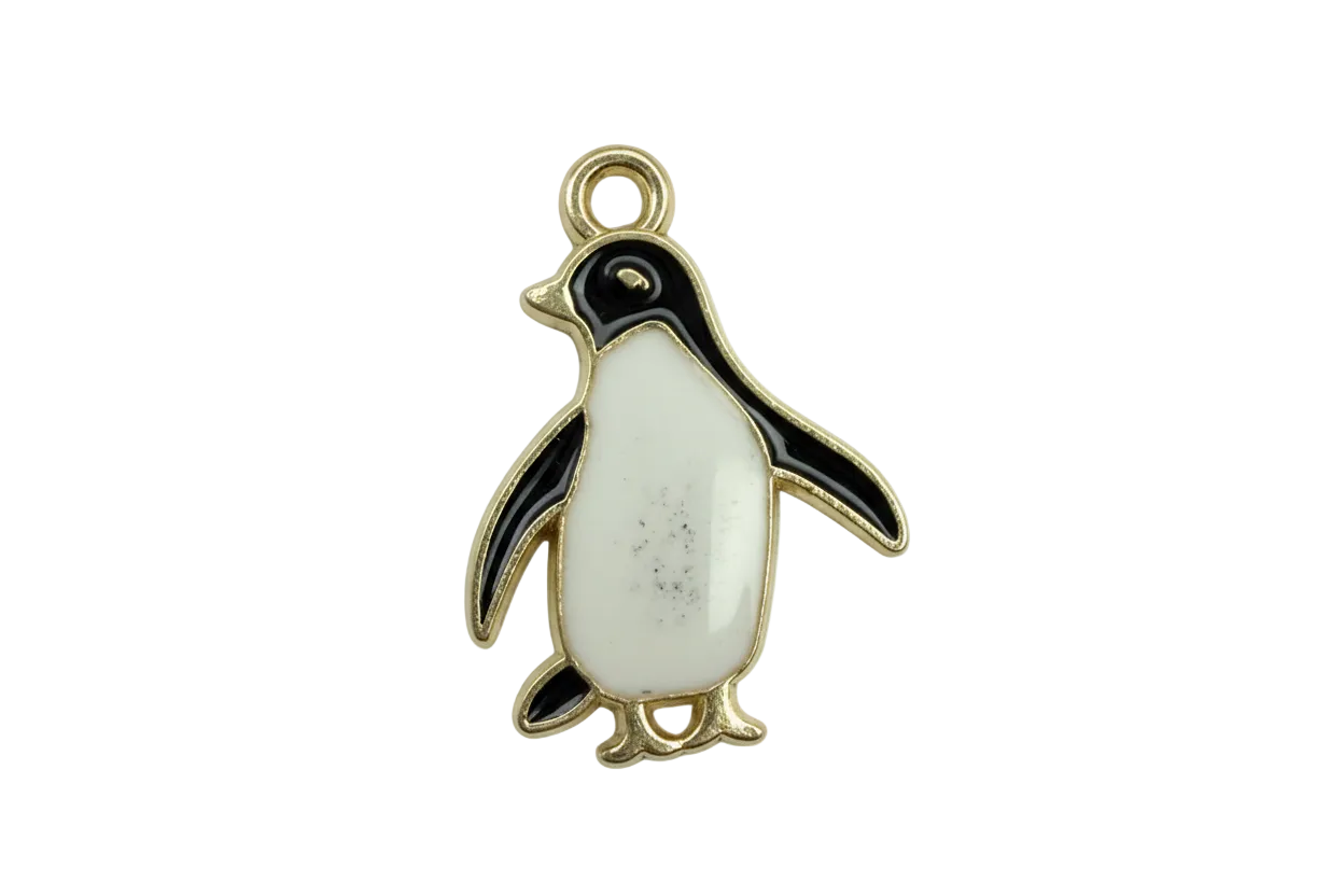 Black and white enamel penguin with gold outline