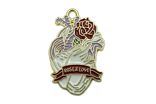 Gold-outlined anatomical heart with red rose, lavender leaves, and “ROSE & LOVE” banner