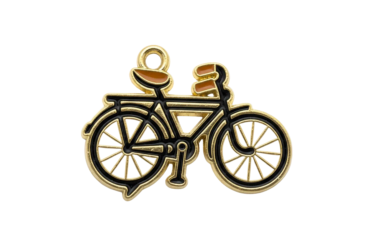 Gold bicycle silhouette charm with black enamel lines, white wheels, and caramel accents