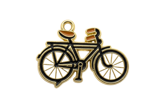 Gold bicycle silhouette charm with black enamel lines, white wheels, and caramel accents