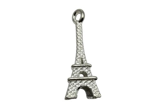 Textured Eiffel Tower pendant in silver-tone metal with oxidized detailing on black background