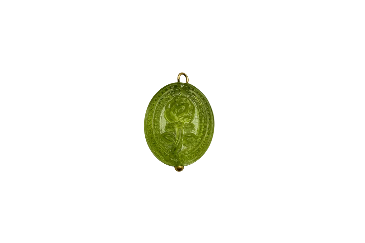 Green oval rose medallion with gold accents, embossed floral detail