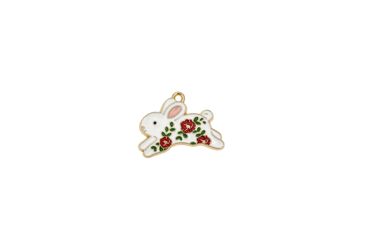 White rabbit with red flowers, green leaves, and gold outline
