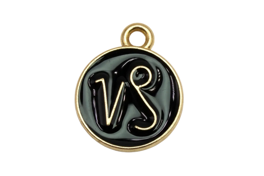 Round black enamel disc with gold border and VS script initials
