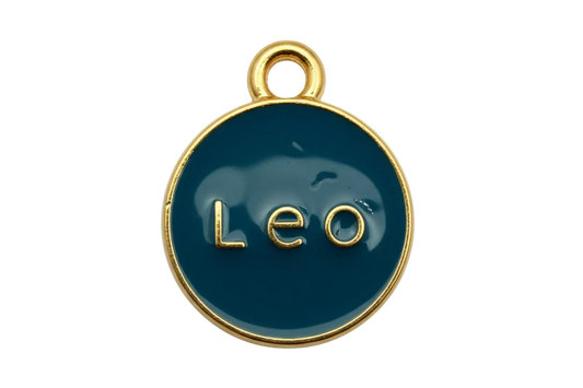 Glossy navy round medallion with raised gold “Leo” lettering and gold border