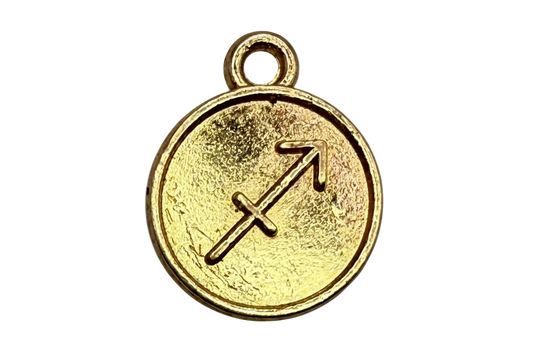 Round gold coin medallion with engraved Sagittarius arrow zodiac symbol
