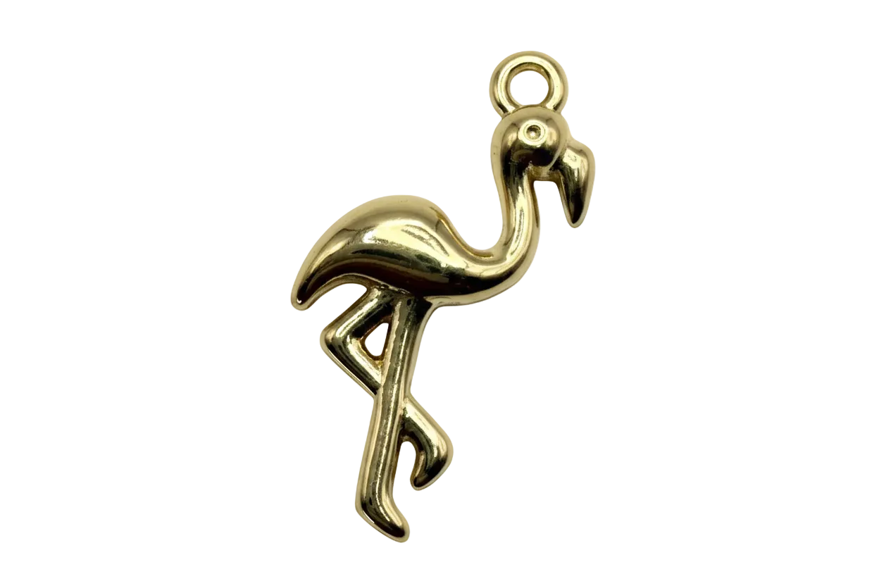 High-polish gold flamingo silhouette with long curved neck and crossed legs