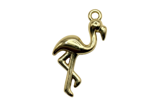 High-polish gold flamingo silhouette with long curved neck and crossed legs
