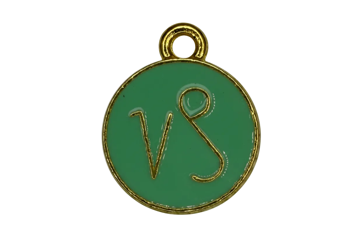 Round green enamel disc with gold border and VS letters