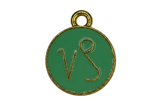 Round green enamel disc with gold border and VS letters