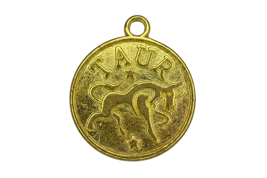 Round gold medallion with embossed kangaroo, stars, and AUSTRALIA lettering