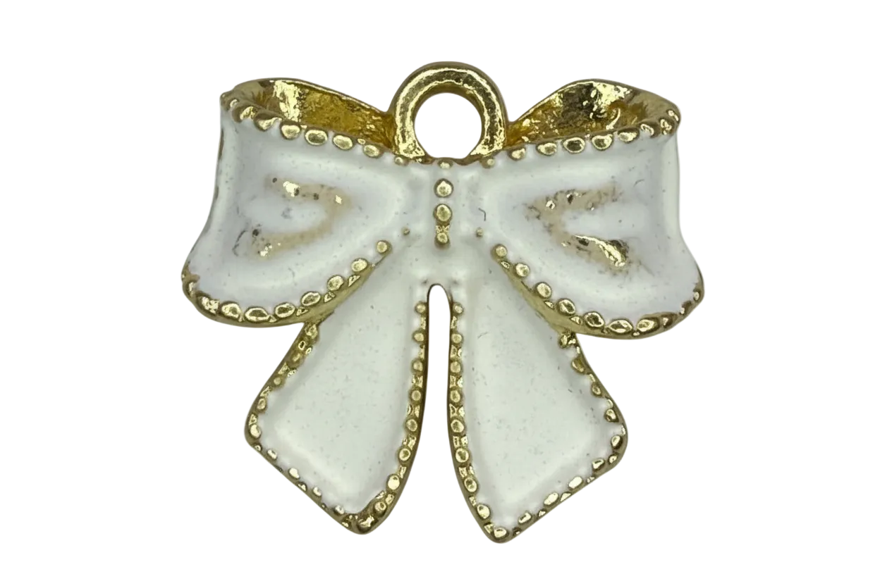 White enamel ribbon bow with gold beaded trim and polished gold details