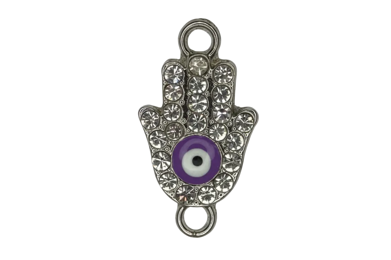 Silver hamsa hand with clear crystals and a purple evil-eye center