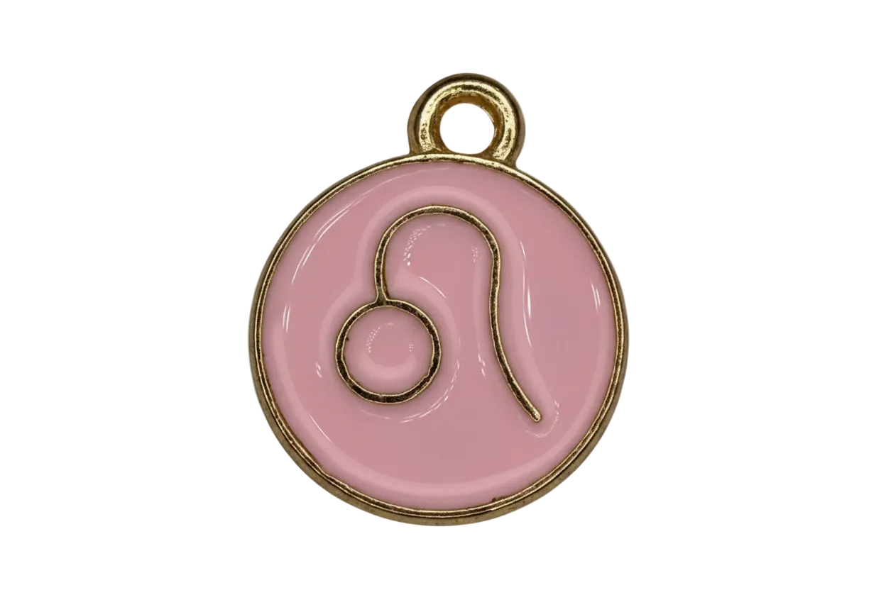 Round blush-pink enamel medallion with raised gold Leo zodiac symbol