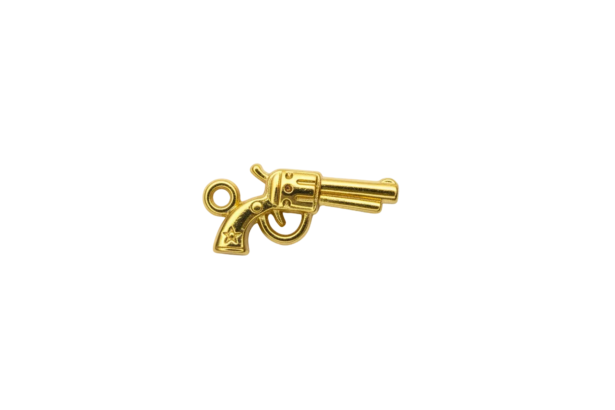 Polished gold revolver pistol with engraved details