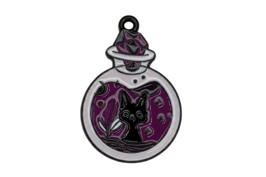 Silver-tone round potion bottle with purple enamel, black cat silhouette, and moon details
