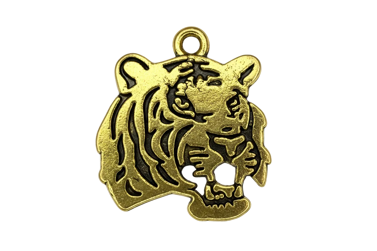 Antique gold tiger head pendant with blackened etched details