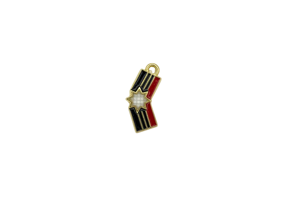 Gold striped ribbon with black, red, and ivory starburst center