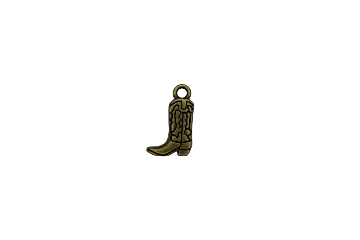 Antique gold cowboy boot with etched detailing