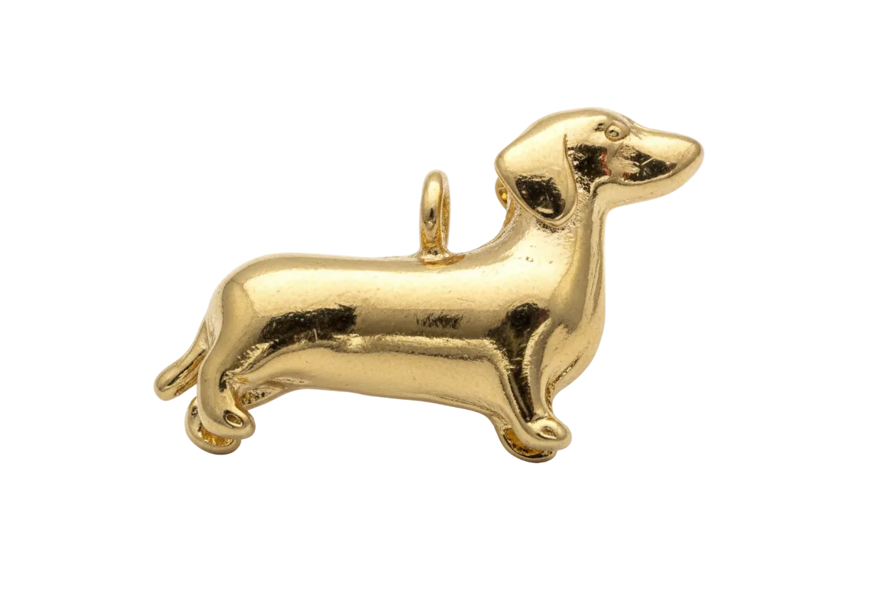 High-polish gold dachshund dog silhouette with smooth sculpted details