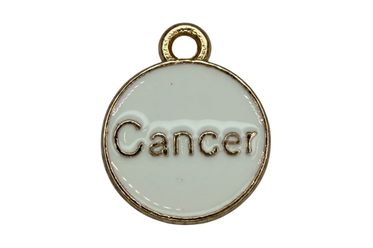 Round white enamel disc with raised gold Cancer lettering and gold rim