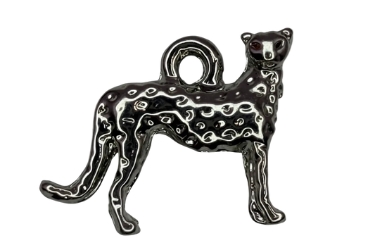 Black enamel spotted leopard cat figure with silver outlining and a small red eye accent