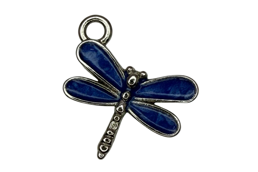 Deep blue enamel dragonfly charm with polished silver detailing on black background