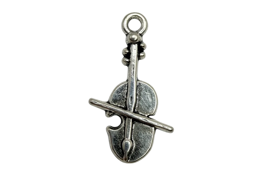 Antique silver artist palette with paintbrush motif on black background