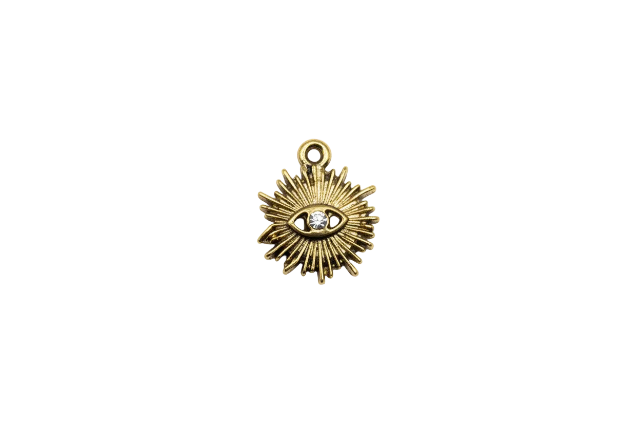 Gold sunburst eye with clear crystal center