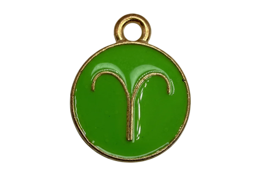 Round glossy green enamel disc with raised gold Aries zodiac glyph