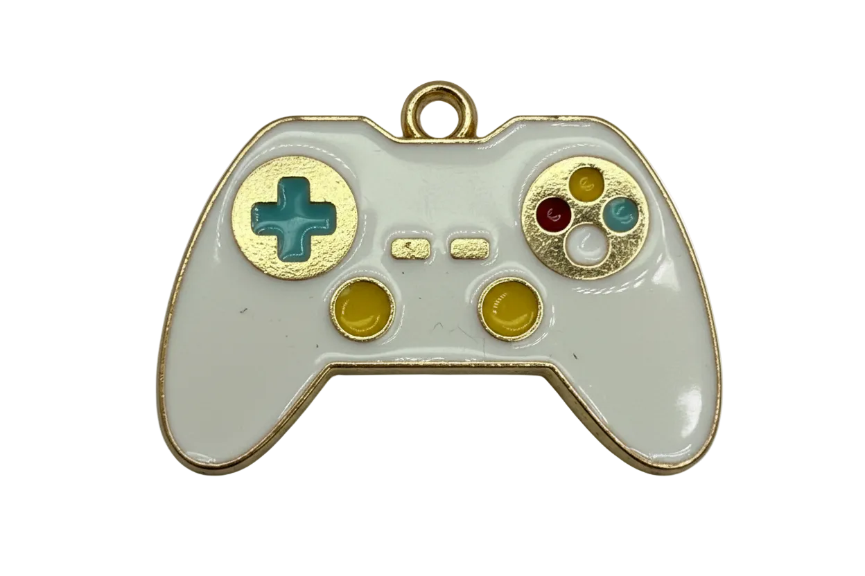 White enamel game controller charm with gold trim and multicolor buttons