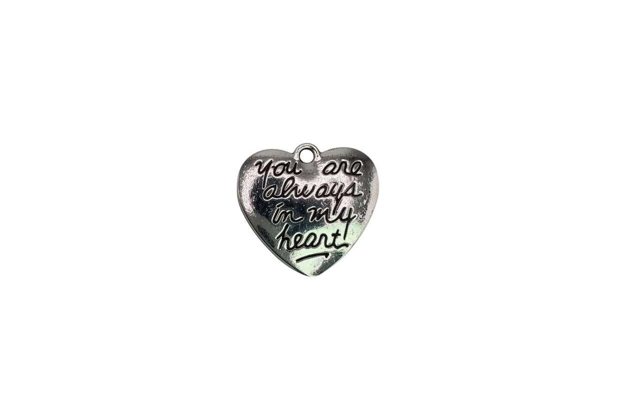 Silver heart with raised “I love you to the moon and back” script