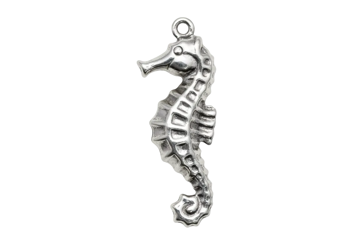Antiqued silver seahorse charm with curled tail and sculpted ridges