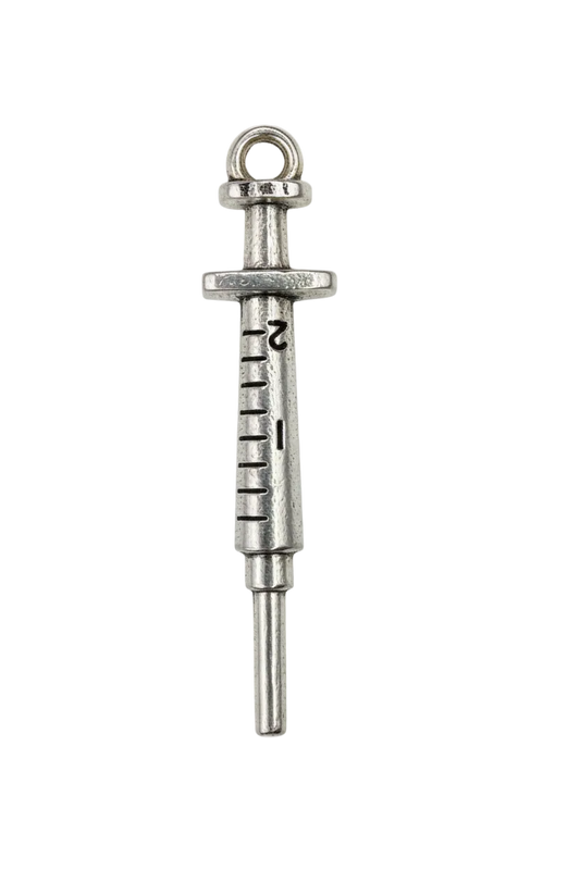Antiqued silver syringe charm with engraved measurement marks