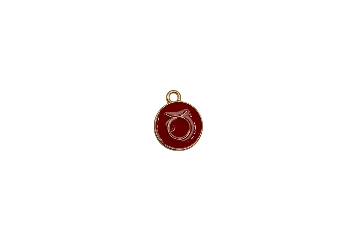 Red enamel Taurus zodiac medallion with gold outline